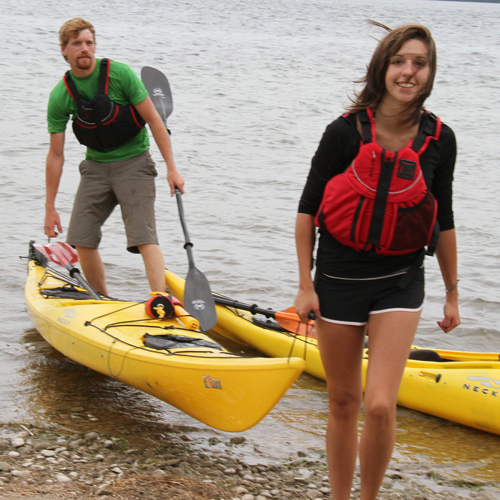 Couple with Ungava black and red PFDs