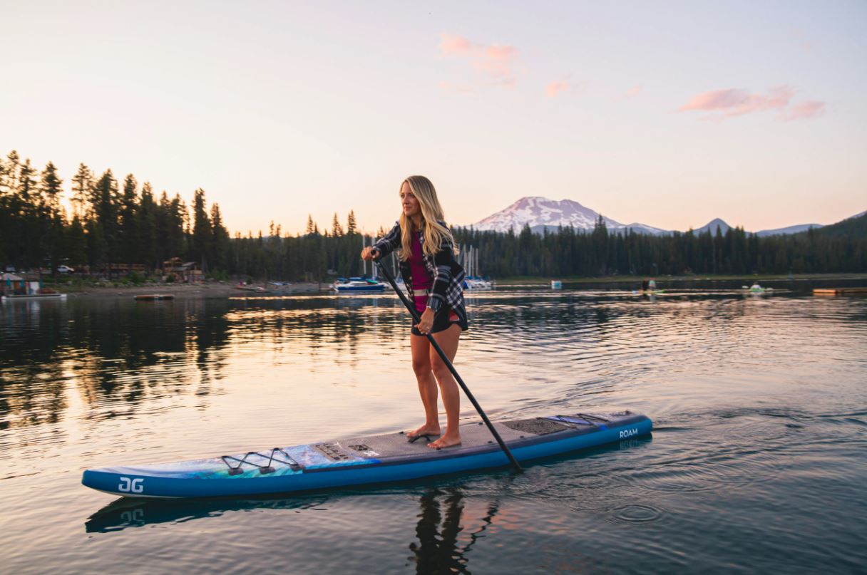 woman on aquaglide paddleboard
